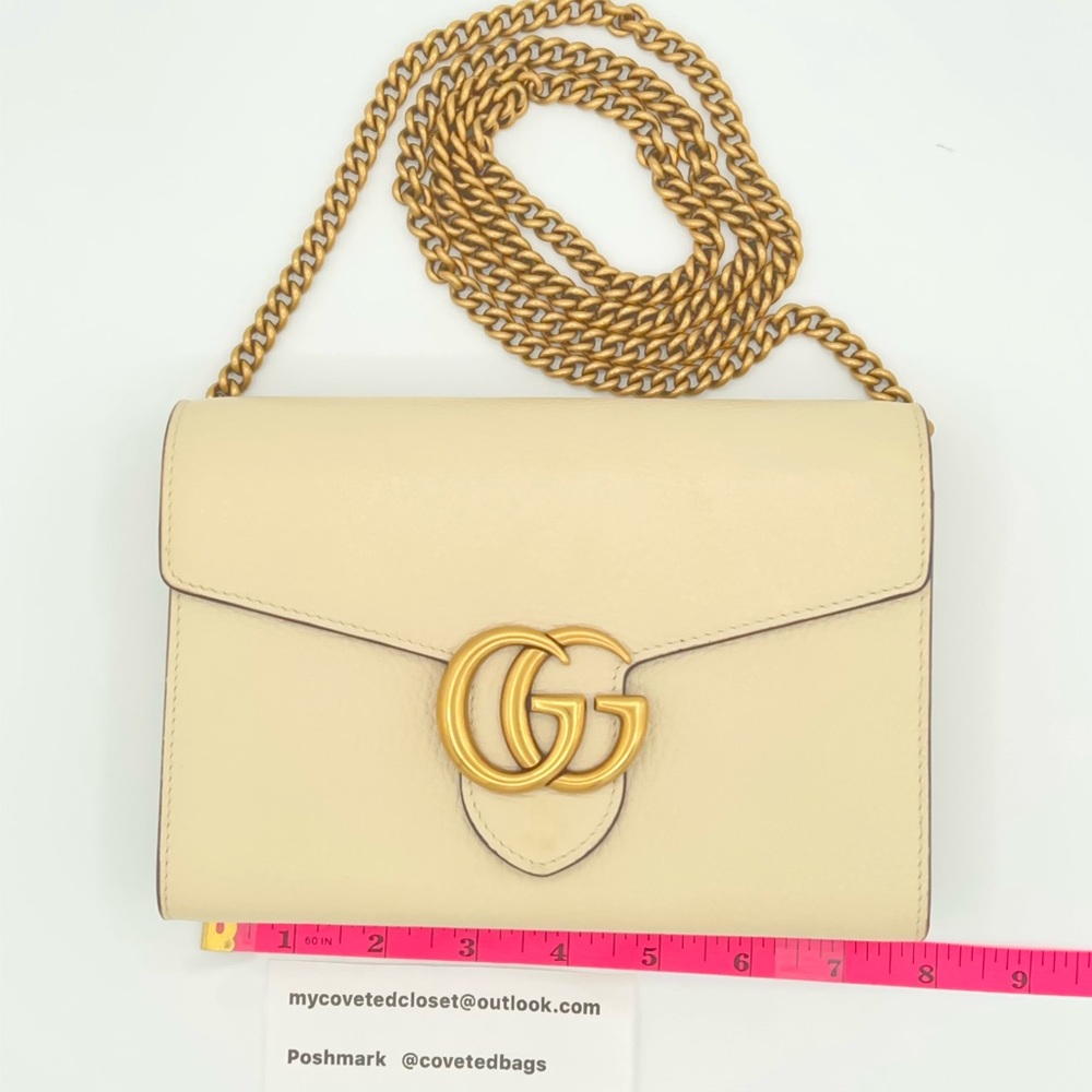 Gucci GG Ivory Leather WOC W/Gold Hardware in Beautiful Condition!